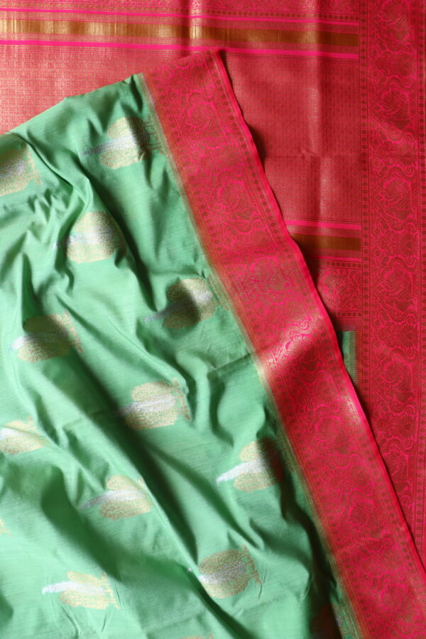 Lite green dupion silk saree with contrast peacok border - Image 2